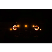 Amber marker lights on Jeep JL grill headlights.