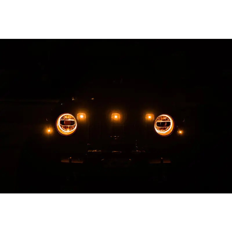 Amber marker lights on Jeep JL grill headlights.