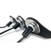 Black earphones with metal handle on DV8 Offroad Jeep JL grill amber marker lights.