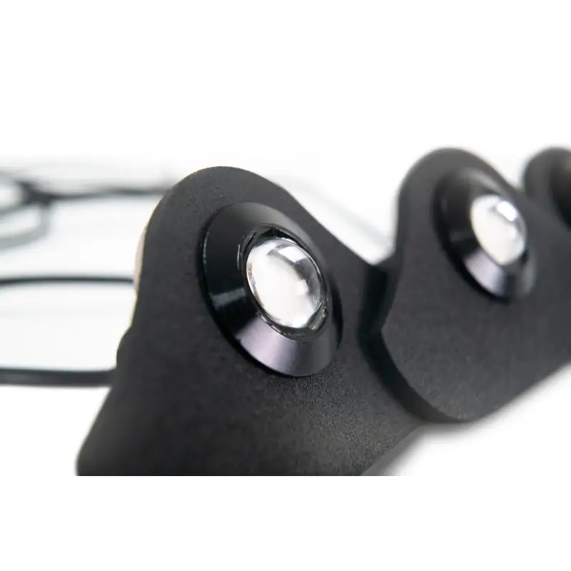 Plastic black eye glasses displayed on DV8 Offroad 2018+ Jeep JL Grill Amber Marker Lights