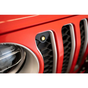 Red Jeep JL grill with black grill and amber marker lights