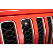Red Jeep JL grill with yellow marker lights