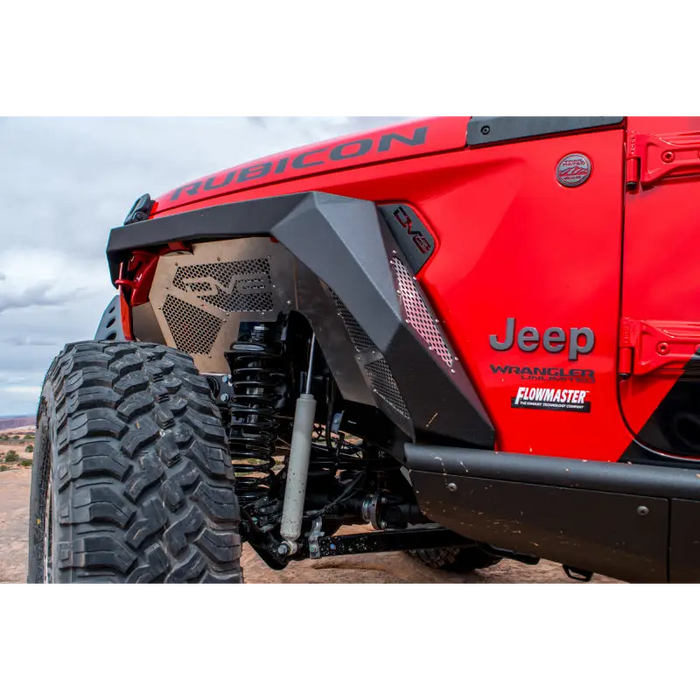 Red Jeep with large tire, DV8 Offroad 2018+ Wrangler JL Armor Fenders with LED Turn Signal Lights