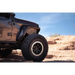 Black DV8 Offroad 2018+ Jeep Wrangler JL Front Inner Fenders parked in desert