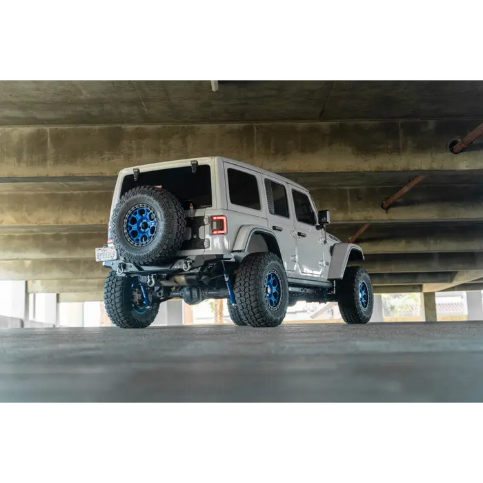 DV8 Offroad 2018 Jeep Wrangler JL FS-15 Series Rear Bumper parked under bridge