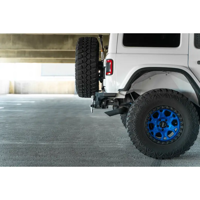 DV8 Offroad 2018 Jeep Wrangler JL FS-15 Series Rear Bumper with White Jeep Front Tire and Blue Wheels