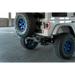 DV8 Offroad 2018 Jeep Wrangler JL FS-15 rear bumper with big tire parked in parking lot