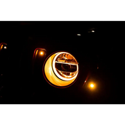 DV8 Offroad 2018+ Jeep Wrangler JL/Gladiator LED Projector Headlights - car with lit headlight