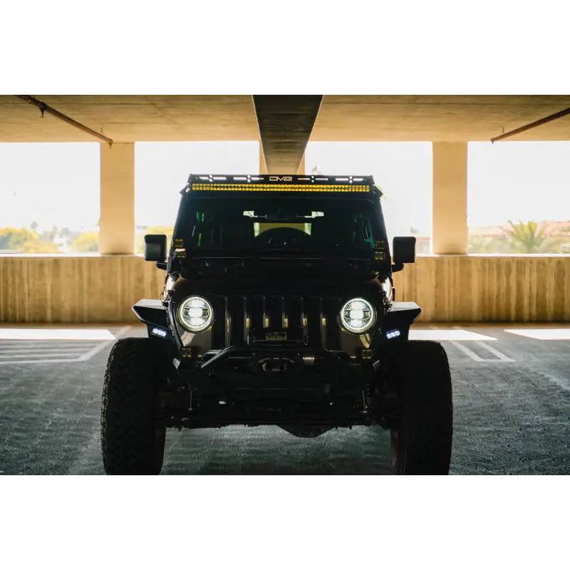 DV8 Offroad 2018+ Jeep Wrangler JLO A Pillar Dual Light Pod Mounts parked in lot