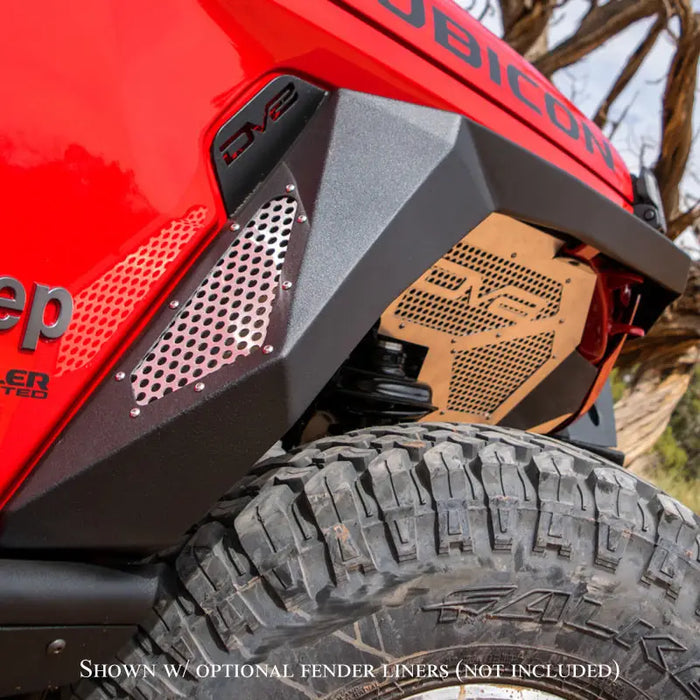 DV8 Offroad 2019+ Jeep Gladiator Armor Fenders featuring a close up of a red jeep with black grill and tire