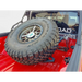 DV8 Offroad adjustable tire carrier for Jeep Gladiator with front tire.