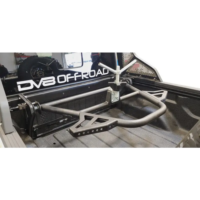DV8 Offroad 2019+ Jeep Gladiator In-Bed Adjustable Tire Carrier with Front Bumper Removed