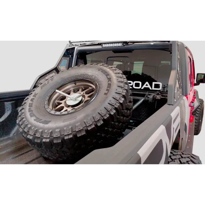 DV8 Offroad 2019+ Jeep Gladiator In-Bed Adjustable Tire Carrier with Tire