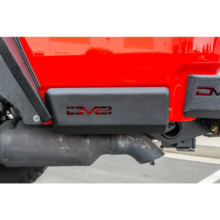 Red and black DV8 Offroad Jeep Gladiator Bedside Sliders featuring two trucks with black bumpers.