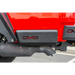 Red and black DV8 Offroad Jeep Gladiator Bedside Sliders featuring two trucks with black bumpers.