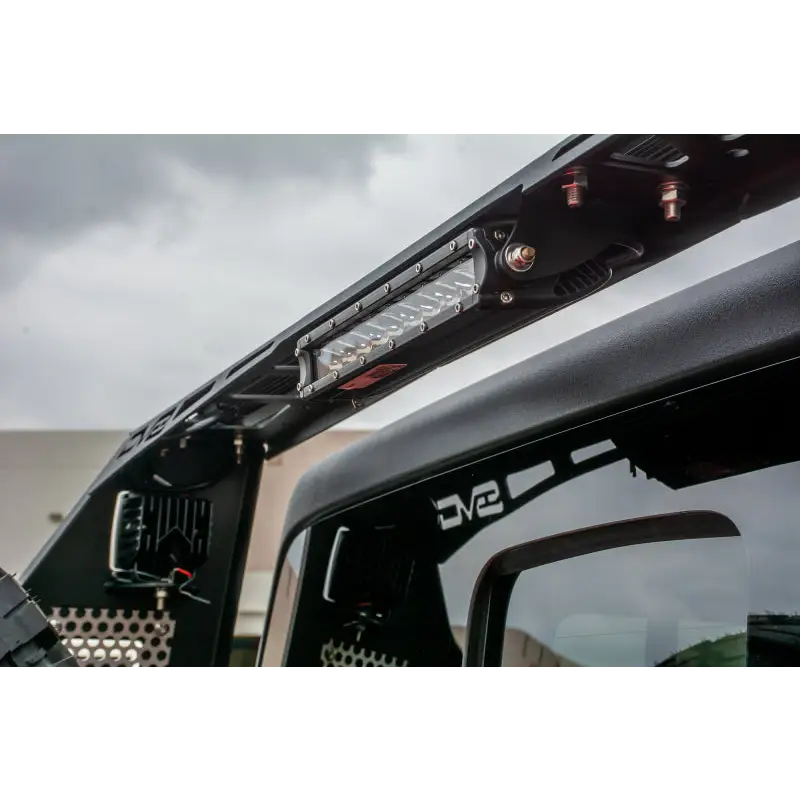 Front view of truck with lights on - DV8 Offroad 2019+ Jeep Gladiator Bolt On Chase Rack