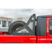 Red truck with black tire cover on DV8 Offroad 2019+ Jeep Gladiator Bolt On Chase Rack