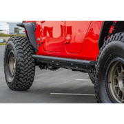 Red Jeep Gladiator with black tire cover - DV8 Offroad 2019+ Side Step/Sliders anti slip panels.
