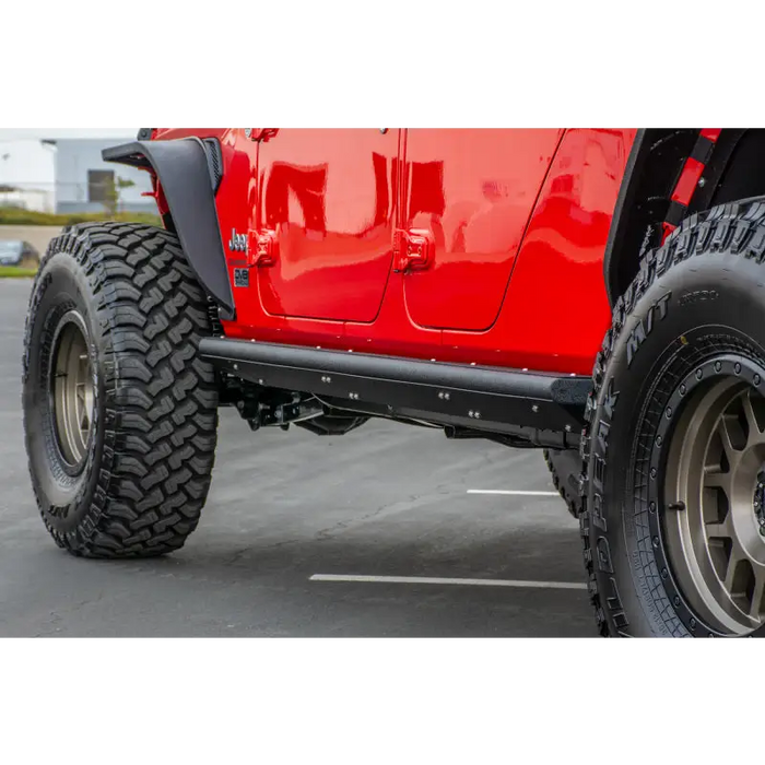 Red Jeep Gladiator with black tire cover - DV8 Offroad 2019+ Side Step/Sliders anti slip panels.