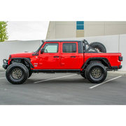 Red Jeep Gladiator with black bumper and wheels by DV8 Offroad featuring anti-slip panels