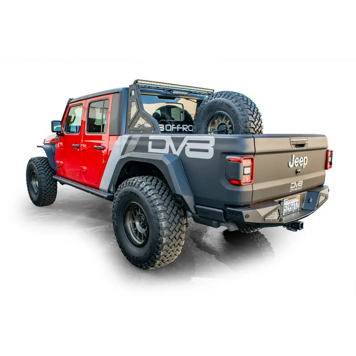 DV8 Offroad Jeep Gladiator Universal Stand Up In-Bed Tire Carrier with Large Tire.