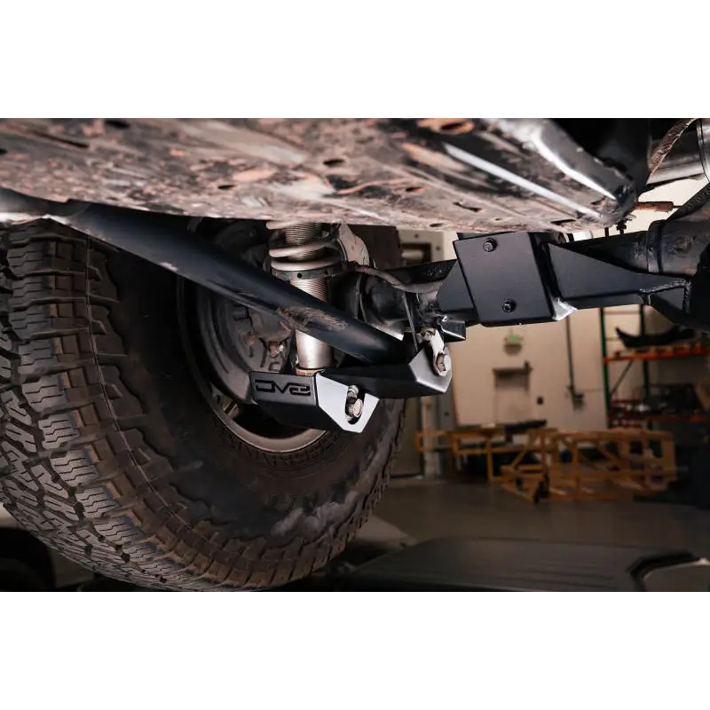 DV8 Offroad 2021-2022 Ford Bronco Rear Shock Guard Skid Plate with mounted front bumper on rear bumper.