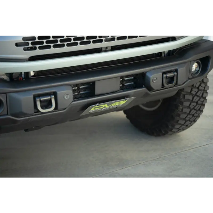 Close up of the OEM capable steel front bumper cover on a Ford F350 from DV8 Offroad.