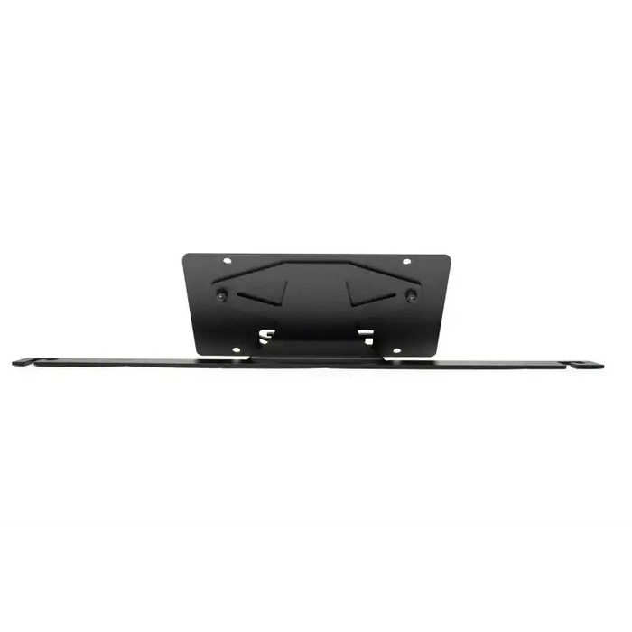 DV8 Offroad 2021 Ford Bronco Capable Bumper Slanted Front License Plate Mount with black metal shelf mounted on wall.