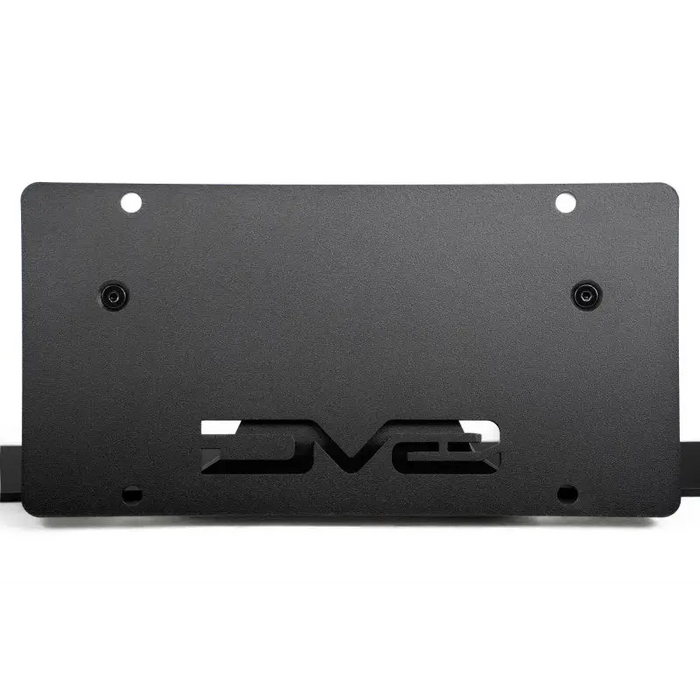 Black license plate with ’evc’ on it mounted on DV8 Offroad 2021 Ford Bronco slanted front license plate mount.