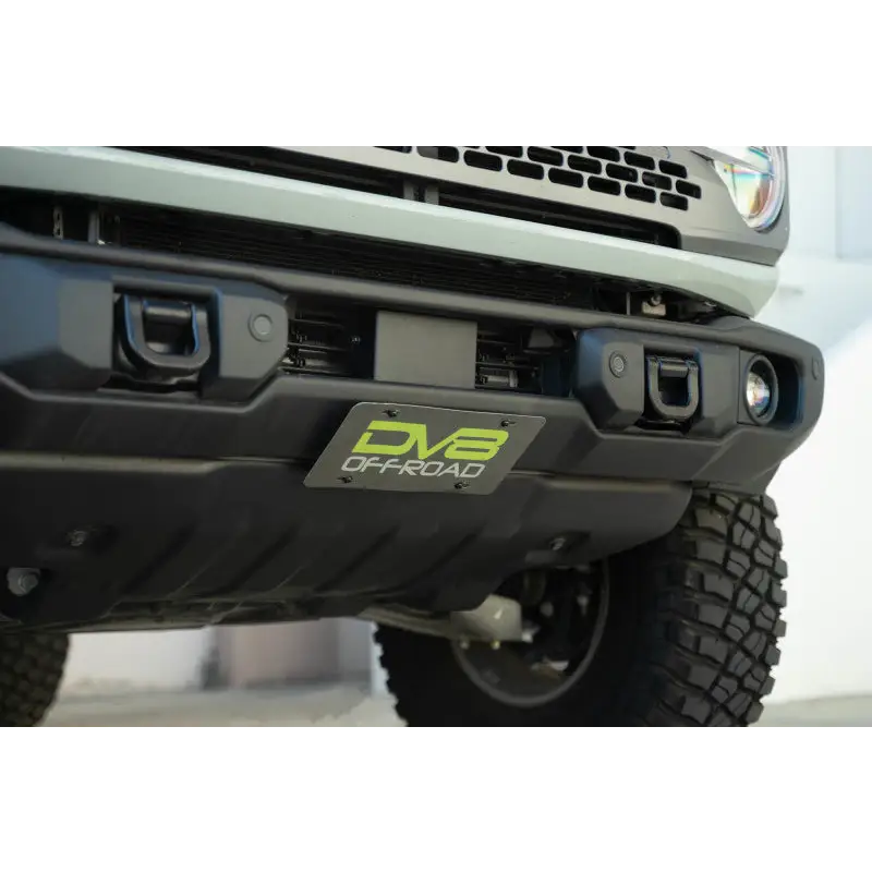 Close up of front bumper cover on Ford F350 with slanted license plate mount.