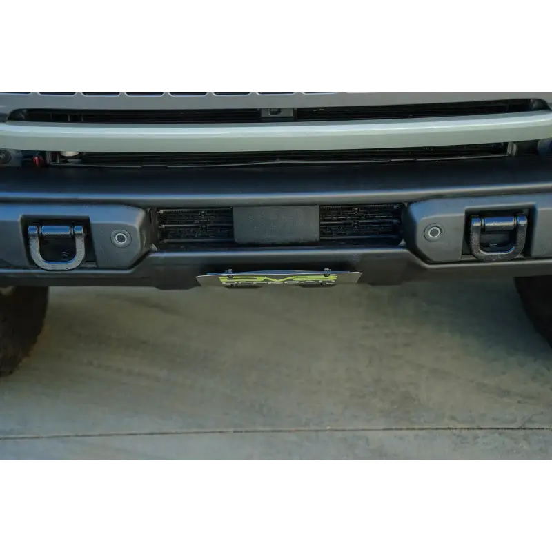 Rear bumper with bumper bar on DV8 Offroad 2021 Ford Bronco, license plate mount.