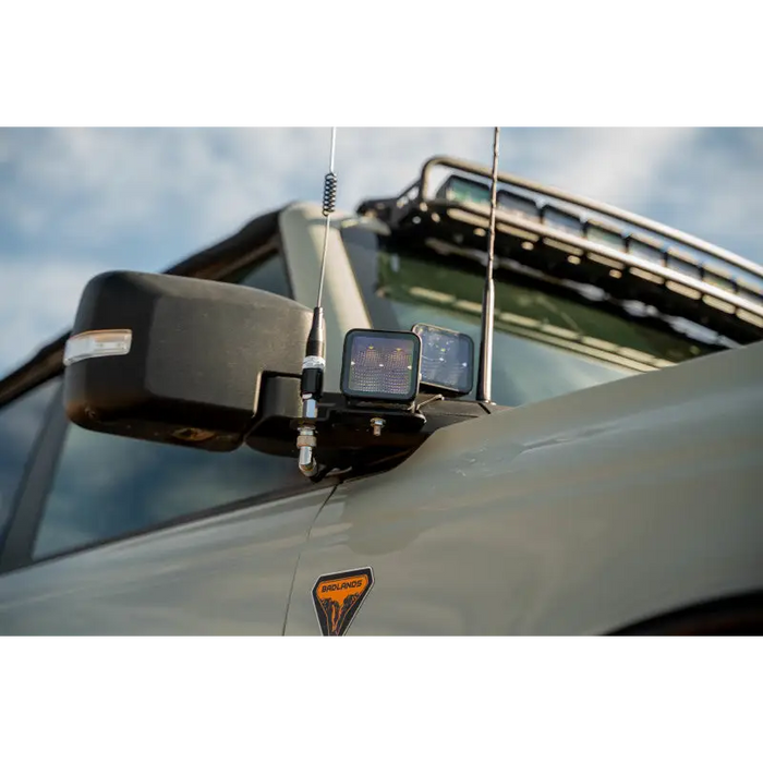 DV8 Offroad 2021 Ford Bronco A Pillar Dual Light Pod Drop Mounts with cell phone attached to rear window