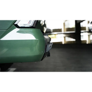 Green car with white tail light on DV8 Offroad 2022-2023 Toyota Tundra MTO Series Rear Bumper