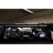 Interior view of Ford Bronco 4dr with DV8 Offroad rear speaker & light mount bar