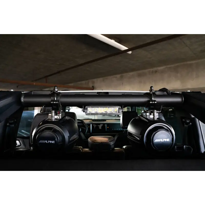 Interior view of Ford Bronco 4dr with DV8 Offroad rear speaker & light mount bar