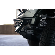 Close up of DV8 Offroad Ford Bronco Competition Series Front Bumper truck tire