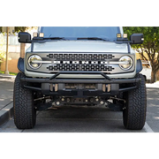 White Jeep with Black Bumper and License Plate Relocation Bracket