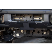 Close up of car bumper with license plate relocation bracket for Ford Bronco.