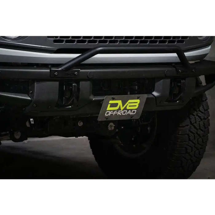 DV8 Offroad black truck front bumper with license plate relocation bracket
