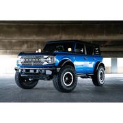 DV8 Offroad license plate relocation bracket for Ford Bronco under bridge parking garage.