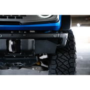 Close up of Jeep front bumper mount with license plate relocation bracket.