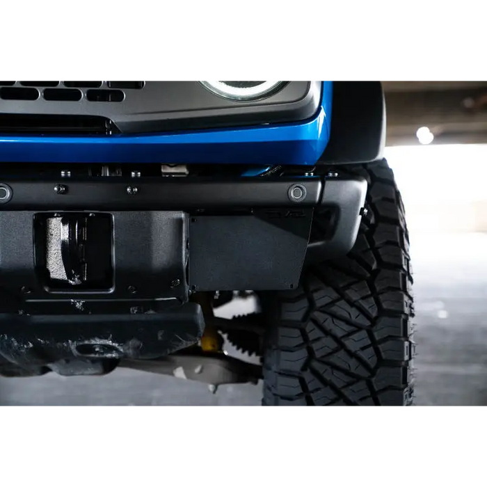 Close up of Jeep front bumper mount with license plate relocation bracket.