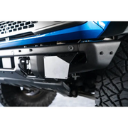Blue Jeep Wrangler front bumper license plate relocation bracket