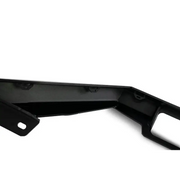 Close-up of black metal bull bar on white surface, DV8 Offroad Ford Bronco bumper.