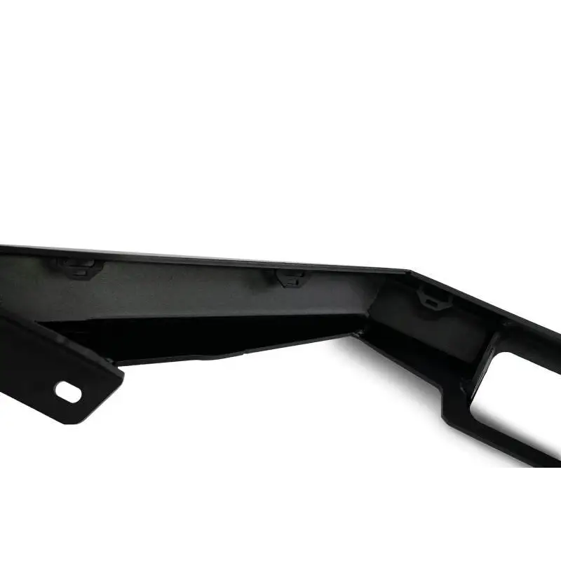 Close-up of black metal bull bar on white surface, DV8 Offroad Ford Bronco bumper.