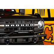 DV8 Offroad Ford Bronco bull bar grille and logo close up.