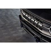 Black truck with chrome grille, DV8 Offroad Ford Bronco Bull Bar.