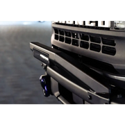 Close up of keyboard and mouse on desk with DV8 Offroad 21-22 Ford Bronco Factory Modular Front Bumper Bull Bar.