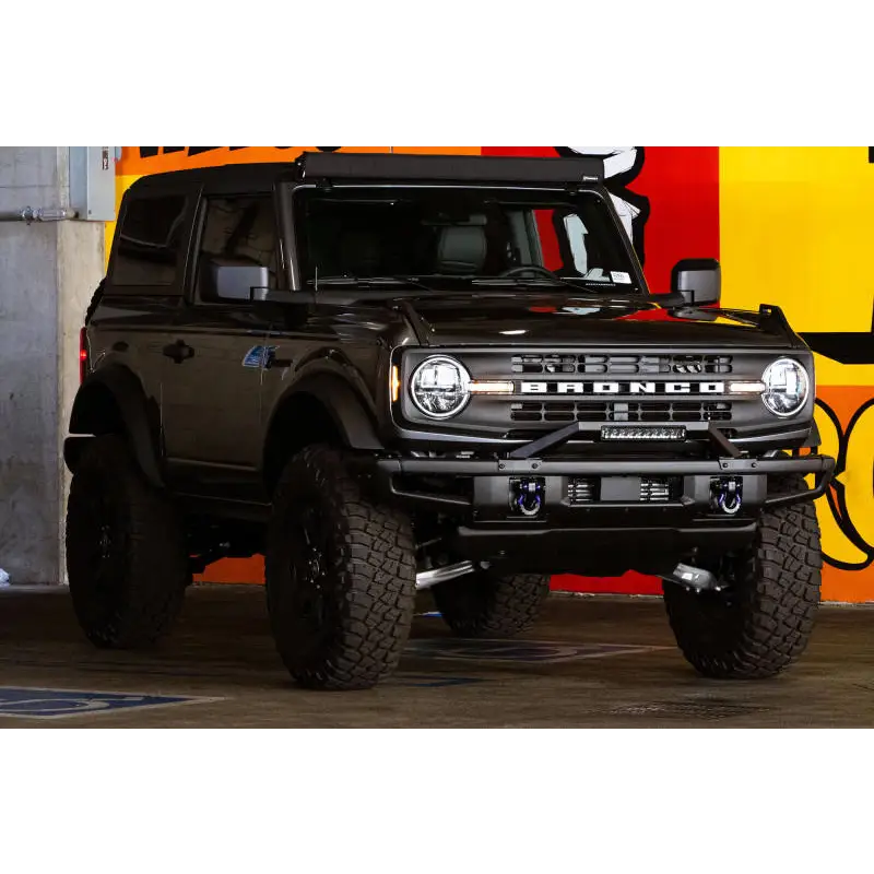 DV8 Offroad black jeep with bull bar on Ford Bronco front bumper