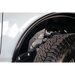 DV8 Offroad front inner fender liners for Ford Bronco with white car and black tire cover.